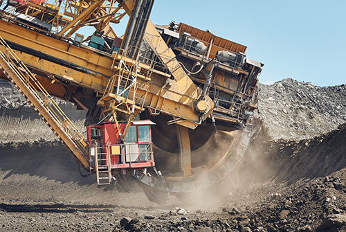 giant yellow coal mining machine